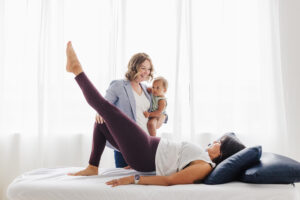 physical therapist working with mom post c-section