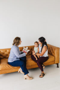 Pelvic floor physical therapist answering a patient's questions about C-section recovery